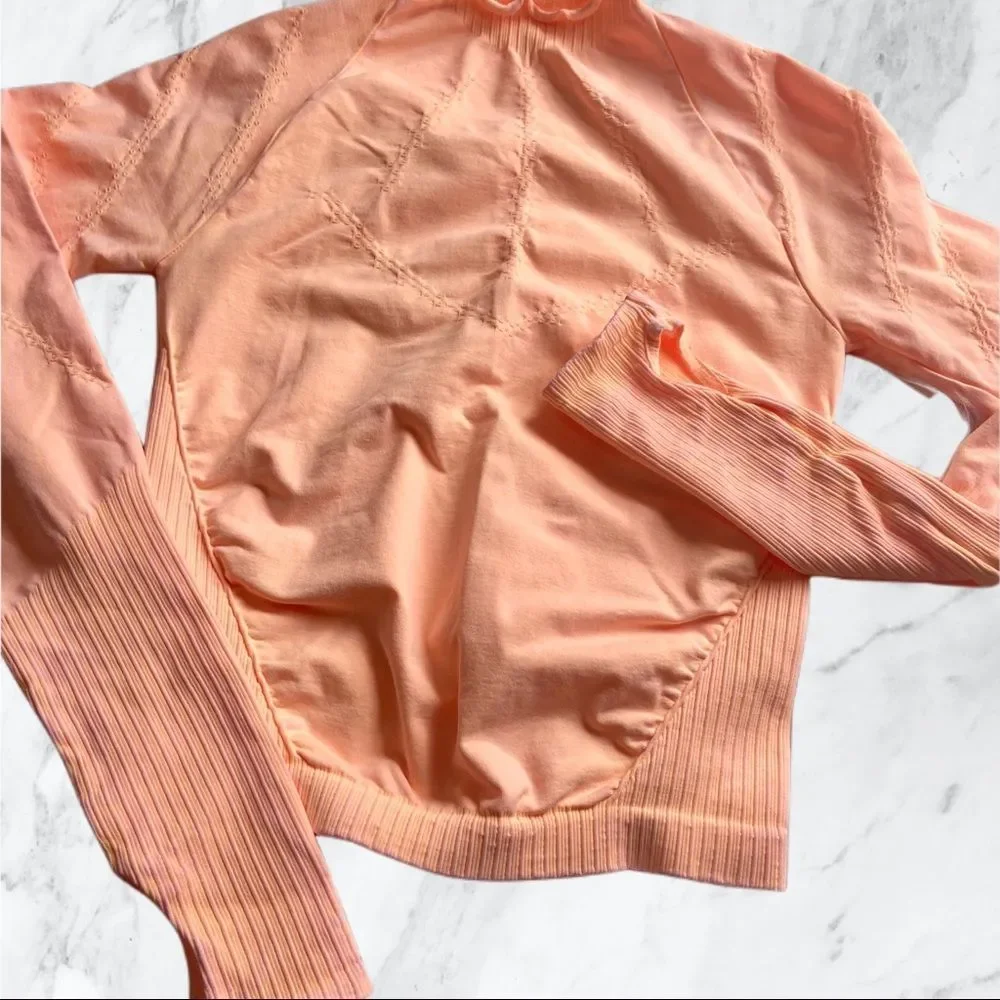 8. New! Free People Movement Good Karma Hi-Neck Layer Long Sleeve Top in Peach - Picture 6 of 12